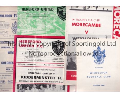 NON-LEAGUE IN THE FA CUP     Ten programmes: Wimbledon v Hereford 66/7, Leeds Utd. 74/5 and Colchester Utd. 62/3, Morecambe v
