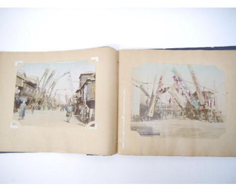 (Japan.) An album containing 75+ albumen print views of Japan c.1890-1900, of which 30 hand tinted, mostly approx. 19 x 26cm,