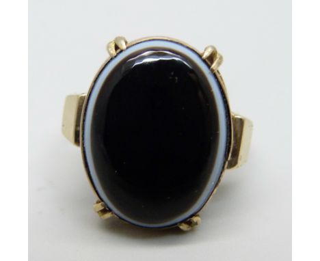 A 9ct gold and bulls eye agate ring, 5g, L 