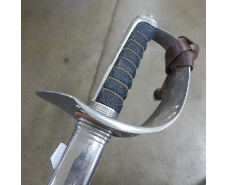 A sword with metal scabbard, the blade marked Wilkinson 