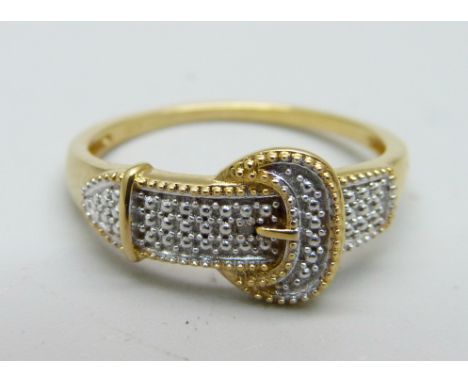 A silver gilt and diamond set buckle ring, R 
