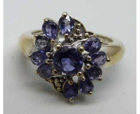 A silver gilt and amethyst cluster ring, S 