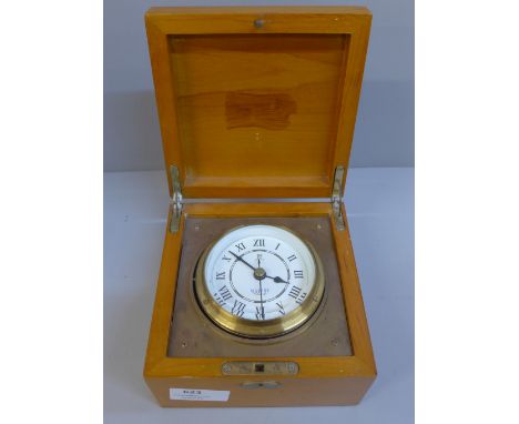 A cased Lamont Marine clock 