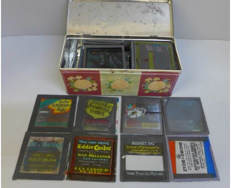 Lantern slides:- tin of sixty cinema lantern slides from the 1940's, appears to be from Leicester area as several slides refe