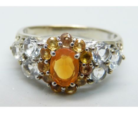 A silver gilt, fire opal, citrine and zircon cluster ring, S 