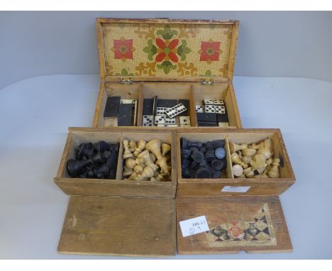A cribbage box and two Staunton chess sets, boxed 