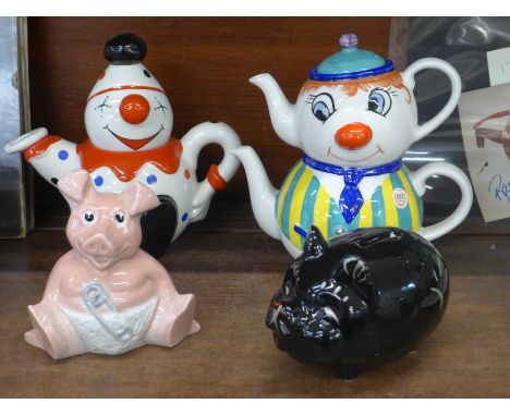 A black ceramic pig moneybank, two Price Kensington hand painted teapots and a Natwest pig moneybox, lacking stopper 