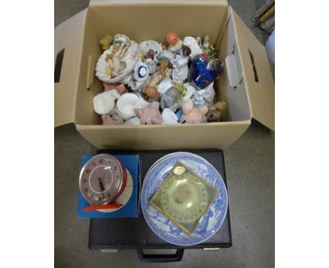 A box of mixed china, Hummel figures, Wade Nat West pigs, clocks and cassette tapes **PLEASE NOTE THIS LOT IS NOT ELIGIBLE FO