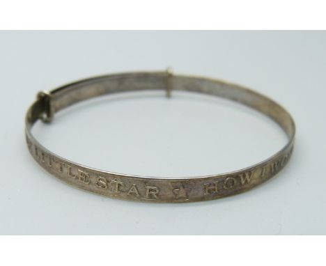 A silver christening bangle 