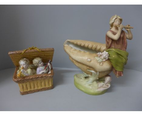 A Royal Dux shell basket, one foot from figure missing and a continental figure group of two children playing musical instrum