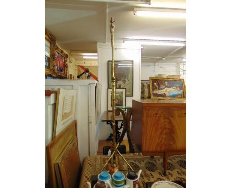 A brass and copper lamp