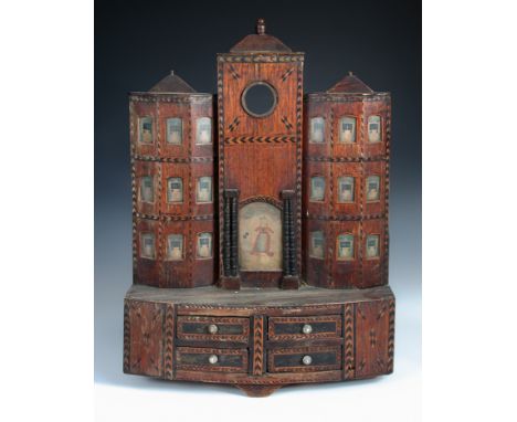 An 18th century architectural watch case, probably prisoner of war work, the facade with central doorway painted with a figur