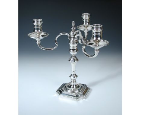 A modern cast silver three light candelabrum, by J B Chatterley & Sons Ltd, Birmingham 1972, in the mid-18th century style ra