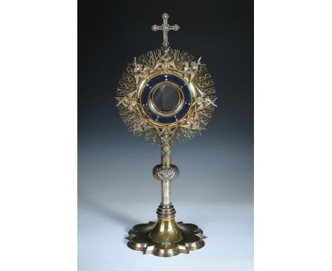 A Victorian silver gilt 'Solar' Monstrance or Ostensorium, by John Hardman & Co, Birmingham 1899, the glazed receiver with a 