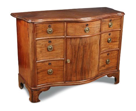 A late Regency mahogany serpentine commode, fitted five drawers and central cupboard, brass handles on bracket feet - alterat