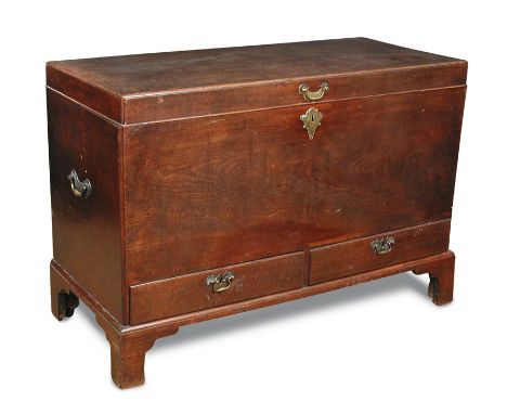 A George III mahogany chest on stand, fitted drawers to the base, brass end carrying handles, on bracket feet 86 x 125 x 56cm