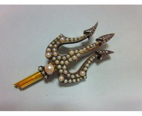 An unusual French 19th century pearl and diamond brooch in the form of a trident, the stylised design with arched and pointed