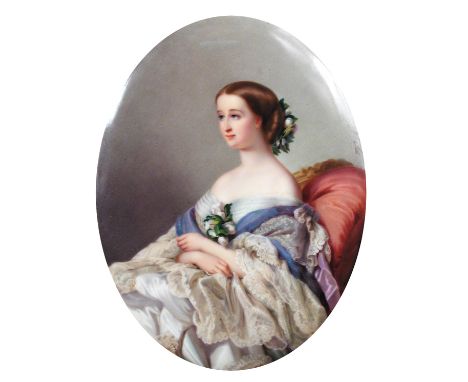 A 19th century Berlin porcelain oval plaque painted with a portrait of the Empress Eugenie (1826-1920) after Franz Winterhalt