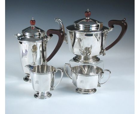 A silver four piece tea set, by Wilson & Sharp (Edinburgh), Birmingham 1929, comprising:- a teapot of tapering octagonal shap