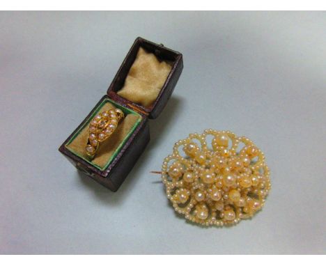 A seed pearl and diamond ring together with a Victorian pearl and seed pearl brooch, the ring with an old cushion cut diamond
