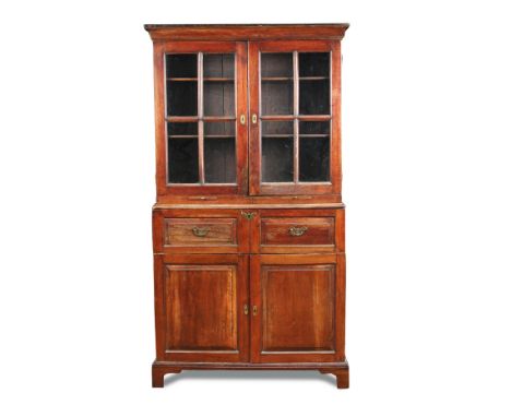 A George II fruitwood estate bookcase, with glazed doors and candle slides above a fitted writing drawer and further drawers 