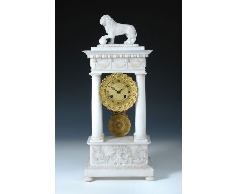 A 19th century French white alabaster portico clock, the case of typical pillar form surmounted by a Medici lion, the gilt di