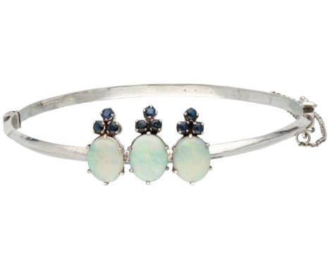 Sterling silver bangle bracelet. Set with 3 cabochon cut white precious opals of approx. 3.00 ct. in total (approx. 10.1 x 8.