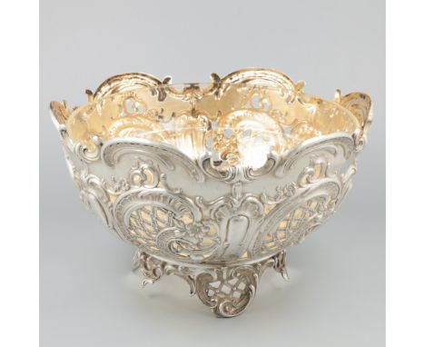 Richly decorated with repoussé rocailles on openwork sides and foot. Equipped with glass insert bowl. Germany, Heilbronn, Bru