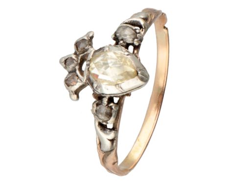 Set with rose cut diamonds including one measuring approx. 5.40 x 3.60 mm (Q-Z) set in closed silver settings on silver foil.