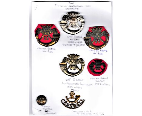 Duke of Cornwall's Light Infantry Badge Collection including: a Cap Badge (White-metal), 1st Volunteer Battalion (Truro), a f