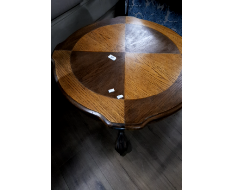 A 2 TONE PEDESTAL LAMP TABLE WITH CLAW AND BALL FEET