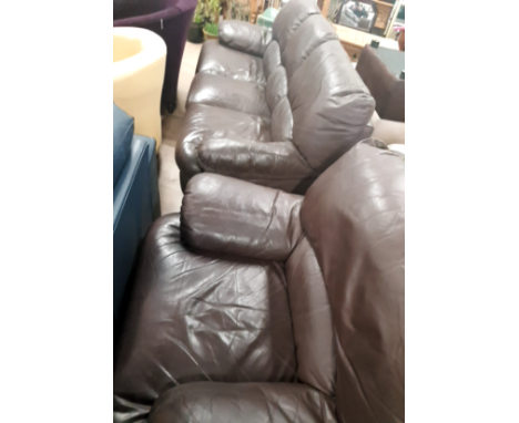 A BROWN LEATHER SOFA AND CHAIR