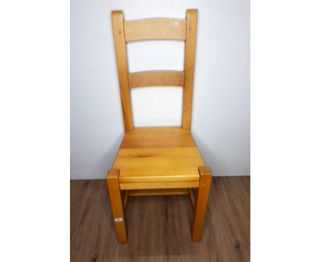 A SET OF 4 LIGHT OAK MODERN DINING CHAIRS