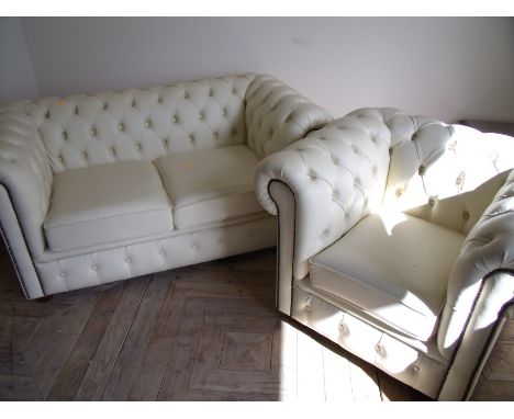 Cream leather two seater button back Chesterfield style sofa and matching armchair