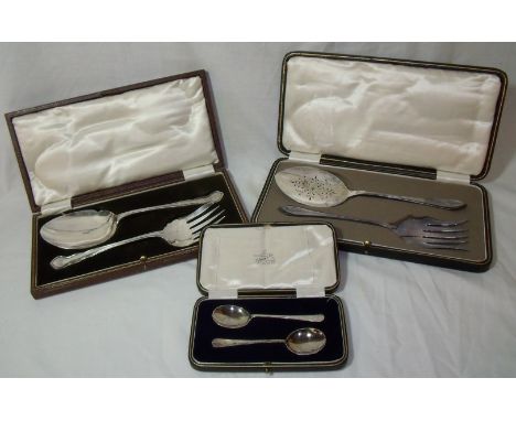 Cased set of silver hallmarked (Sheffield 1923) spoons with bright cut engraving and two cased sets of silver plated serving 