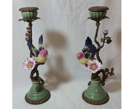 Pair of Continental ceramic and gilt work candlesticks with exotic birds and flowers with printed mark to base (height 33.5cm