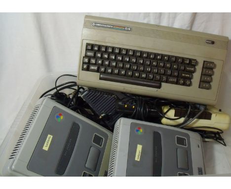 Commodore 64 games console and tape deck, two Super Nintendo game consoles, assorted of controllers etc.