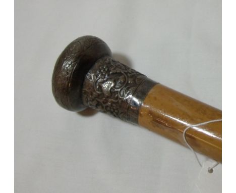 Malacca walking stick with white metal top decorated with grape and vine