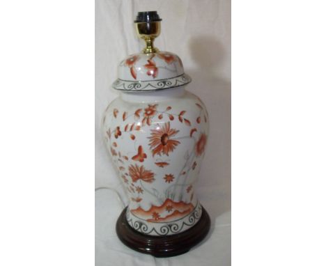 Large baluster table lamp with painted floral sprays on wooden base (height  53cm)