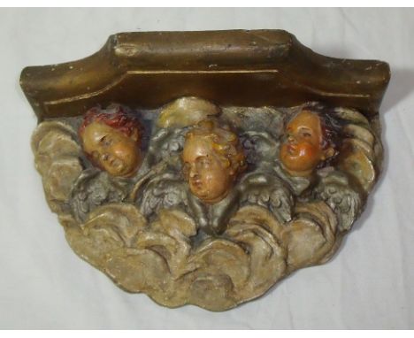 Gilt plaster wall mounted shelf in the style of Joshua Reynolds 'Angels'