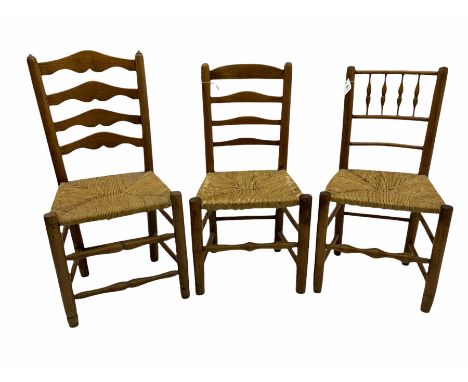 Two 19th century elm ladder back chairs and a 19th century elm spindle back chair