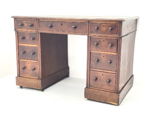 Late Victorian walnut twin pedestal desk of small proportions, rectangular moulded top with leather inset, fitted with nine d