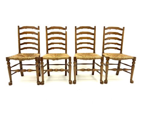 Light oak drop leaf dining table and four ladder back chairs with seats