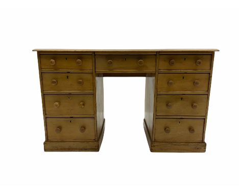 Early 20th century light ash twin pedestal desk, rectangular top with inset leather, nine drawers, plinth baseDimensions: Hei