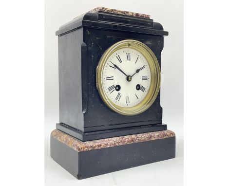Small Victorian black slate and variegated marble mantel clock, the case with engraved decoration, circular enamel Roman dial