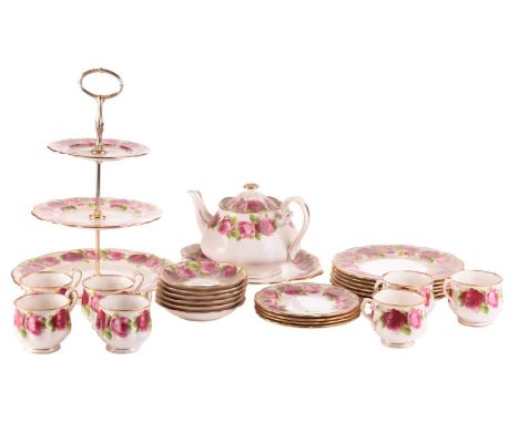 A Royal Albert 'Old English Rose' teaset, comprising a large teapot, three-tier cake stand, a cake plate, four side plates, s