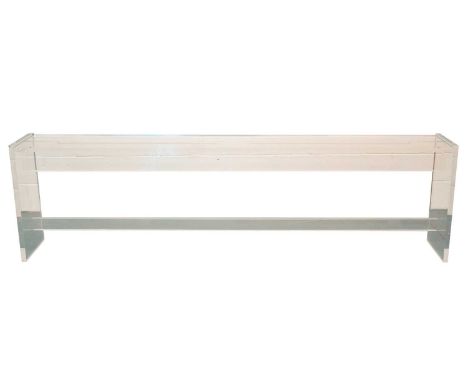 A large vintage lucite console/ side table of plain modernist form with slab ends and a central stretcher. 270.4 cm overall l