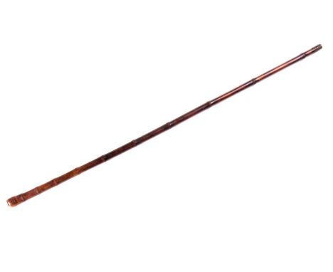 A Victorian cane-bodied "Flick Stick" protection walking cane with an engine-turned brass butt cap and iron en ferrule. 91 cm