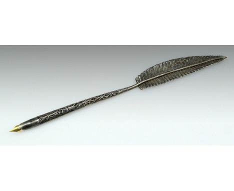 An early 20th century silver and filigree Bezalel pen holder, Jerusalem. Shaped as a feather. Marked: "Bezalel". Length: 20 c
