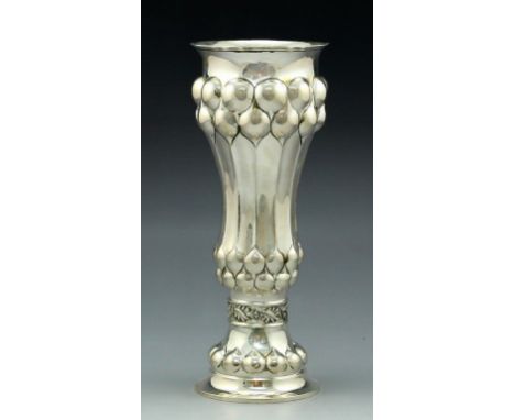 A large 800 silver goblet, Germany, c. 1900. Designed in Baroque style with scale motifs and gilt interior. Height: 27 cm, we